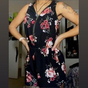 Black and floral print romper.